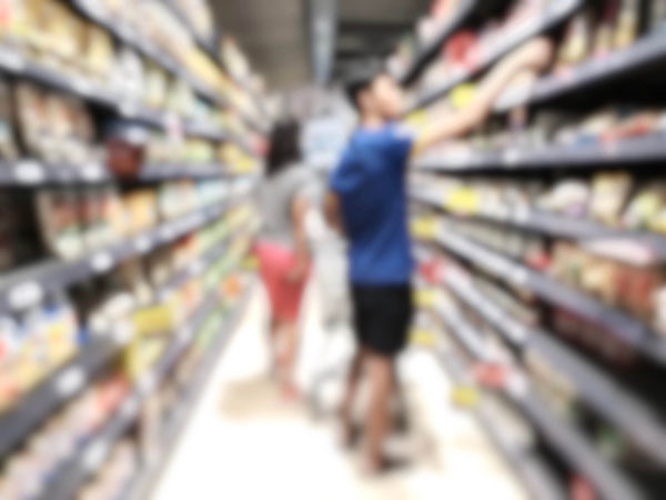 Grocery shoppers with blurry background