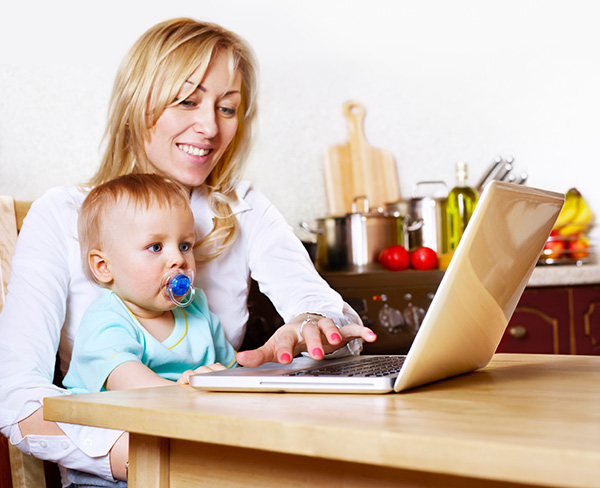 Mom and baby at laptop