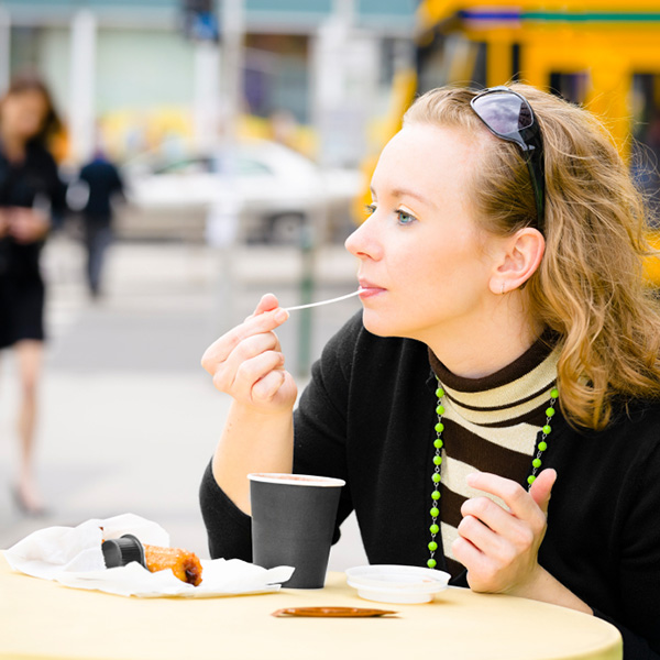 Woman eating alone